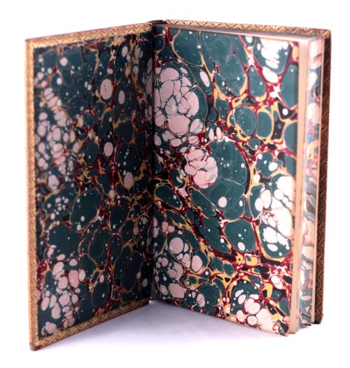 michaelmoonsbookshop:19th century leather bound book with marbled page edges and end papers