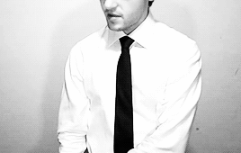 mr-egbutt:  ✟☯~follow for more god damn black and white suit gifs with the face