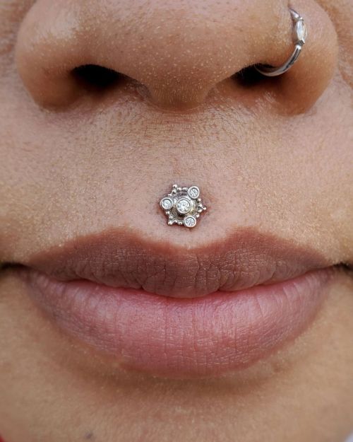 One of my first philtrum piercings back in the game in a long time, recently downsized and looking f