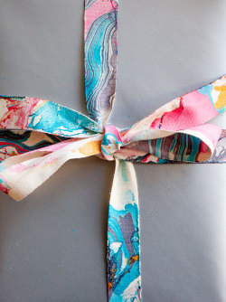 truebluemeandyou:  DIY Nail Polish Marbleized Ribbon Tutorial from Oh Happy Day.This is a messy DIY. All nail polish marbleizing DIYs are - so do not let all the pretty pictures lull you into not taking precautions like lots of newspaper, nail polish