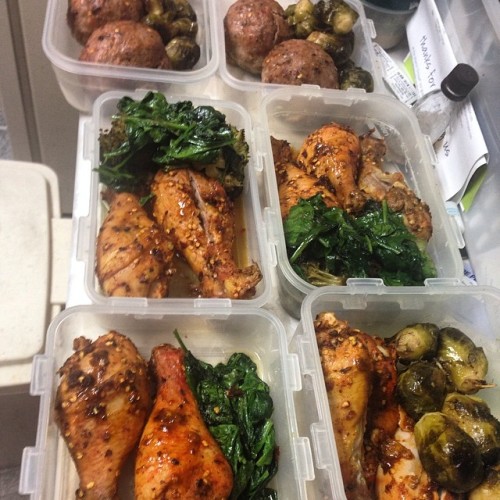 Breakfast and lunch. Mustard curry baked chicken drumsticks, roasted brussel sprouts, sautéed spinac