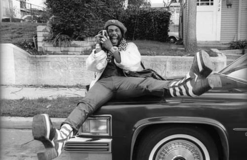 George Clinton of Parliament-Funkadelic sitting on a Cadillac limousine in Hollywood, 1977. Photos b