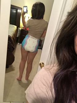 badlilblubunny:  My hair sorta matches these diapers. It’s hard to tell in this pic but I’ve had various hues of pink, purple and blue in my hair since July. 🌈🙃