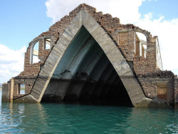 abandonedography: Petrolandia is home to one of Brazil’s largest hydroelectric power plants—during construction, entire towns were moved to higher ground due to flooding. One vestige of the old landscape still remains: the arches of a church that