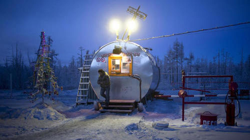 coolthingoftheday:  The village of Oymyakon in northern Russia is one of the coldest permanently inhabited locales on the planet, clocking in at a yearly average of -15.5 C (4.1 F). Picture 1: Oymyakon. Picture 2: The power station is forced to burn