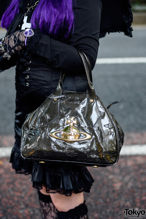 Japanese teens Mahoushozyomiuchan and Kyoppe on the street in Harajuku wearing dark fashion by Never