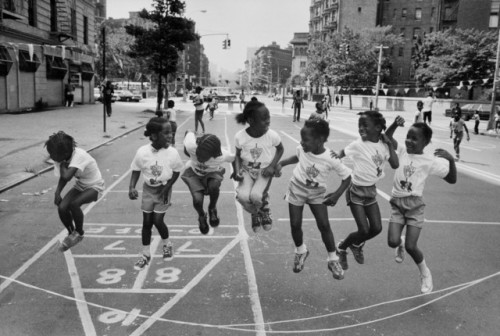 unearthedviews: New York City. Harlem district. 110th street.Festival for the police. © Raymond