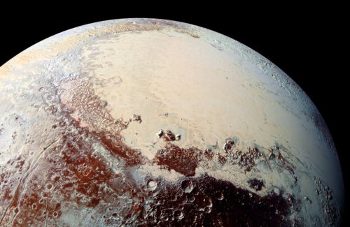 demon-witchling:colourmyfeels:latest photos of Pluto and it’s moon.Whoa