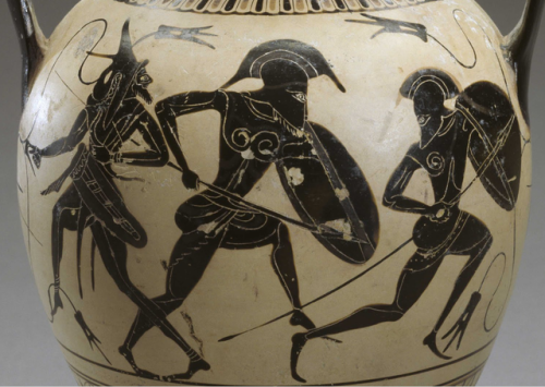 lionofchaeronea:A scene from the Trojan War: as two hoplites clash, Paris (left), in Trojan dress, f
