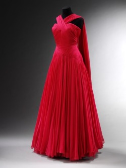 thevintagethimble:  Evening dressJean Dessès (designer),ca. 1953, Pleated silk chiffon with integral boning |. ↳ V&amp;A  