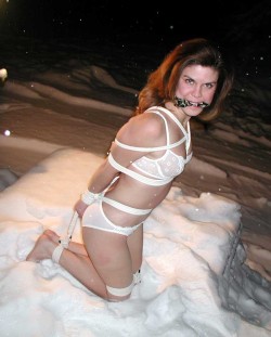 graybandanna:  It’s August and it’s hot outside, how about a hogtie in the snow in her underwear to cool things off