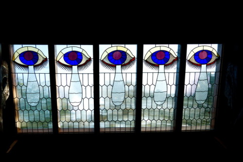 The all-seeing eyes. Window decoration in a “Germanic” hall in the Harz Mountains, 2017.