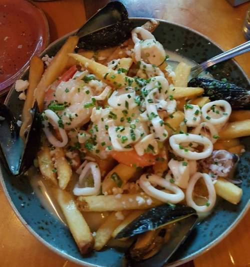 Seafood poutine?? As weird as it sounds it was amazing!! #seafood#poutine#igfood#kingston#ygk#nofilt