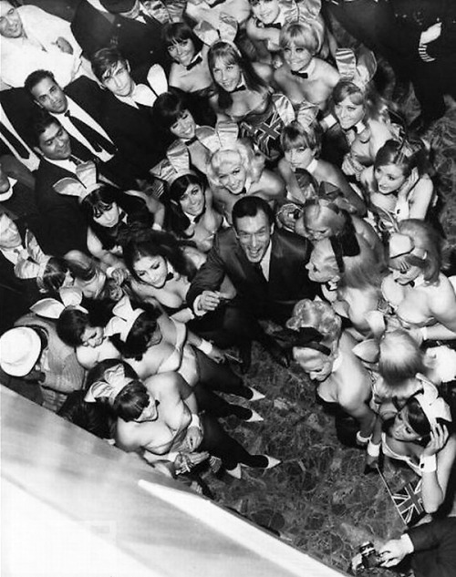 Hugh Hefner, and a bevy of bunnies / at the opening of the Playboy Club in London, July 1, 1966.