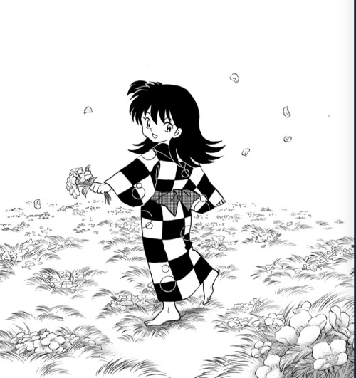 Chapter cover with a cheerful Rin barefoot on the grass holding a bunch of flowers