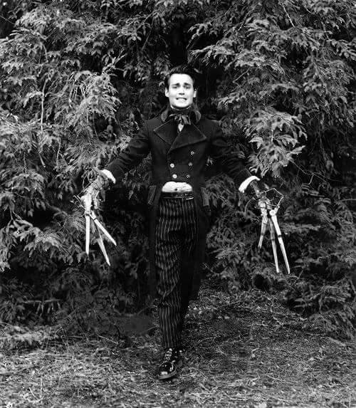 hellyeahhorrormovies:Johnny Depp posing as Edward Scissorhands 1990. That is a nice suit, but where 