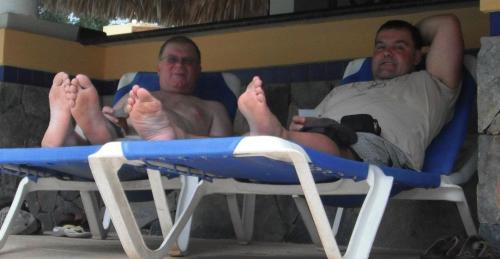 alpha-male-feet:Dad and I waiting for our father/son foot massage session.