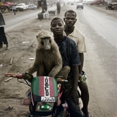 Pieter Hugo shot the series ‘The Hyena & Other Men’ in Nigeria. Pieter was captivated by the first pictures of the ‘hyena men’ that he came across randomly. He went to live with them on the periphery of Abuja in a shantytown – a group of