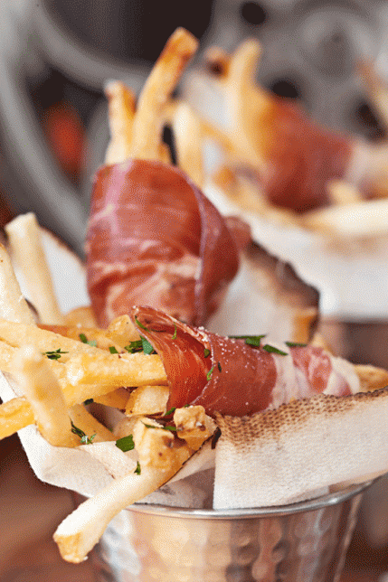 deliciousanddivine:  damnthatsdelicious: Prosciutto-wrapped truffle fries See more