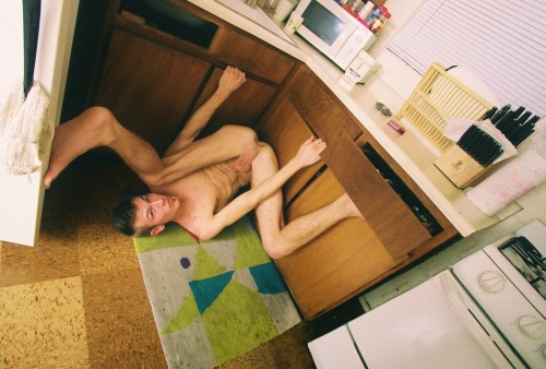 americasfinestkids:  Daniel being flexible in his kitchen. Tempe, Arizona 2007
