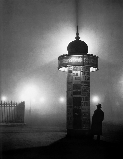 onlyoldphotography:  Brassaï: Morris Column in the Fog, 1932  Brassaï made his name as a chronicler of the night. His book Paris de nuit (1932) surveys the activities and topography of the city after dark, from the louche bars of Montparnasse to the