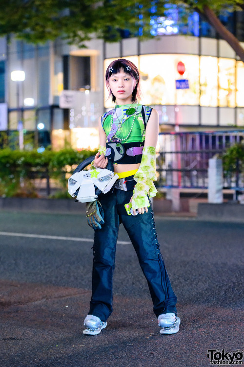 14-year-old Japanese street style personality Raiki on the street in Harajuku wearing a harness by S