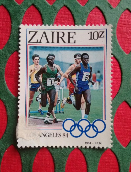 acollectionofstamps:This stamp commemoratesthe participation of the Democratic Republic of Congo (ea