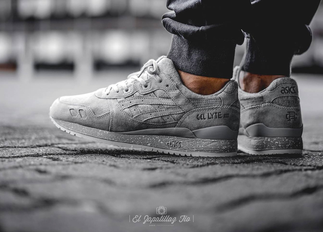 asics reigning champ grey