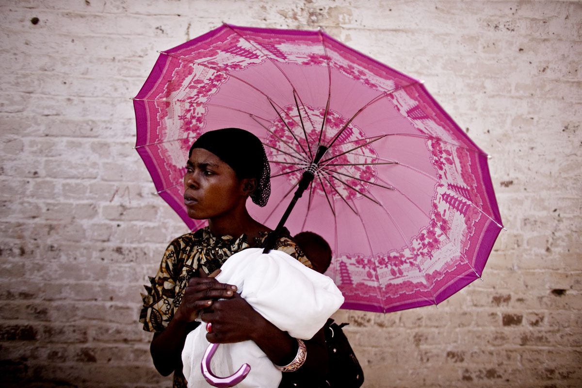 unrar:  A woman waits outside the courthouse to hear sentencing, by Pete Muller.