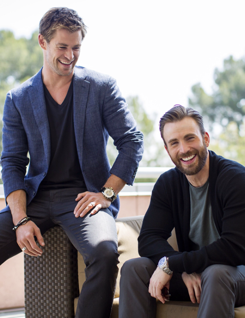 Chris Hemsworth and Chris Evans pose for portraits during “Avengers: Age of Ultron” prom