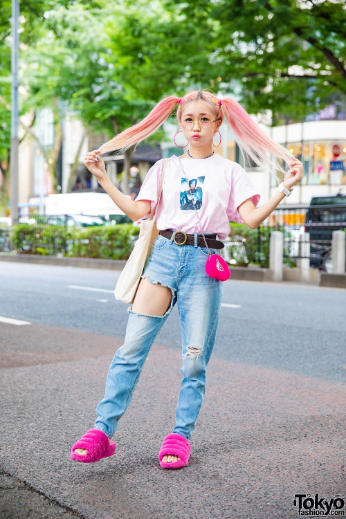 Popular Japanese model Hikapu on the street in Harajuku wearing an FR2 x Robocop t-shirt with cutout