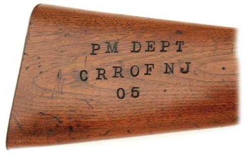 Winchester Model 1897 riot shotgun with Central Railroad of New Jersey markings.from Amoskeag Auctio