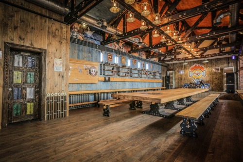 steampunktendencies:    At the CRAZY BBQ’s entrance visitors are greeted by an Austrian steam engine dated by 1900, which now serves as a barbecue.      Surrounded by a pine forest, the complex includes the main restaurant building, the Club House Crazy