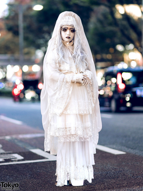 Japanese shironuri artist Minori on the street in Harajuku with hand painted makeup as well as handm