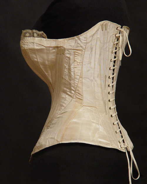 Corset of silk moire, trimmed with lace and embroidered with silk thread, 1854-1855.From the collect