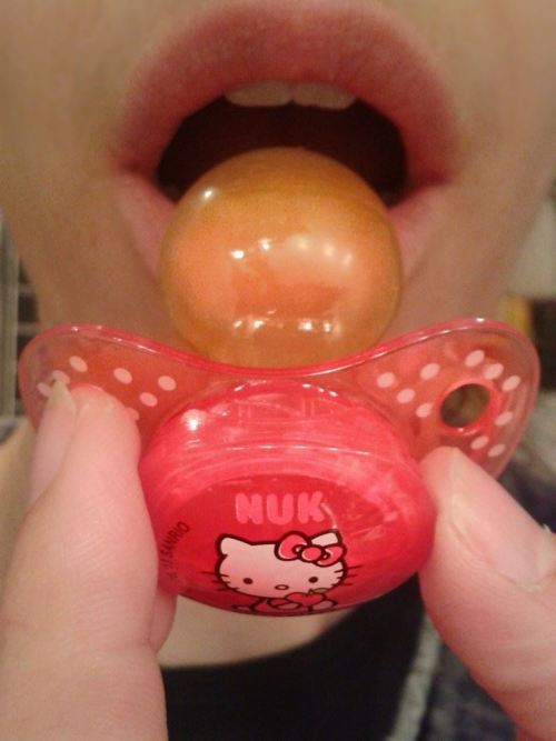 Emma sucking her Hello Kitty PacifierSee more cute Emma pics: http://abdlgirl.comXx Emma