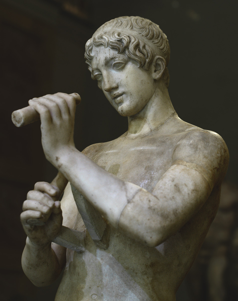 theancientwayoflife: ~Youth playing flute. Medium: Marble Roman copy after a Greek