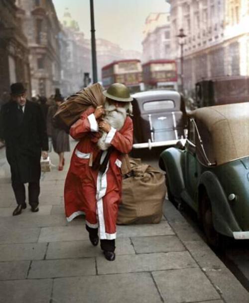bantarleton:Father Christmas walks the streets of wartime London, having sensibly exchanging his tra