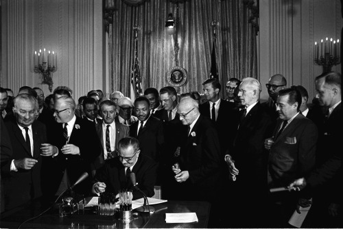 LBJ Signs the Civil Rights Act
On this day in 1964, President Johnson signed the Civil Rights Act of 1964 outlawing discrimination based on race, color, national origin, religion, or sex in public accommodations such as hotels, theaters, parks,...