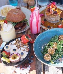 tessbegg:  #VEGAN FEAST for lunch today👅💦 Açai bowl, asian salad + chickpea balls, burger + chips, fluffy pancakes, strawberry milkshake &amp; lazy summer juice👌🏼 @speedoscafe is the place to be! 