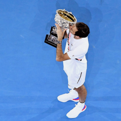 oliviergiroudd:Roger Federer of Switzerland poses with the Norman Brookes Challenge Cup after winnin