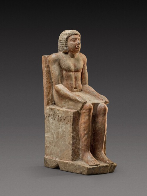 An Egyptian Polychrome Limestone Figure of Hem-Min6th Dynasty, 2360-2195 B.C.Inscribed “Treasu