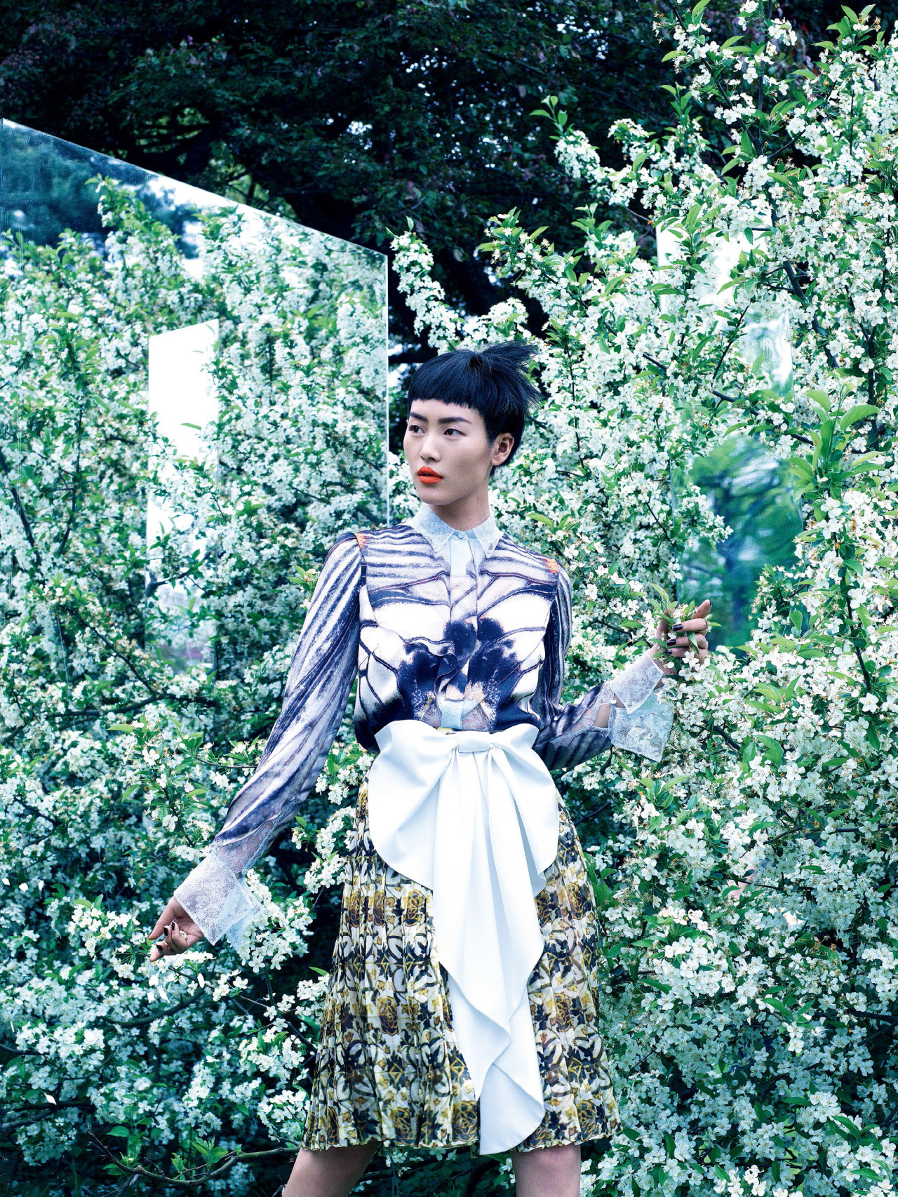 stormtrooperfashion:  Liu Wen in “Mixed Media” by Mikael Jansson for Vogue, August