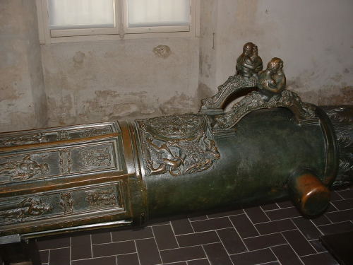 Very ornate bronze cannon on display at the Paris Armory in France.