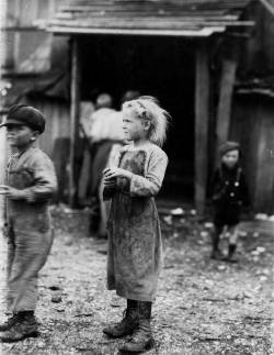 historium:Bertha, one of the six-year-old oyster-shuckers. Began work at 4 A.M. Maggioni Canning Co. Port Royal, South Carolina. February 1912