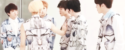 d-ongwoo:  dongwoo feeling myung’s chest jacket  〜(￣▽￣〜) 