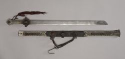 art-of-swords:  Tibetan SwordMedium: iron and silver with bone, turquoise, leather and brassMeasurements: overall length 79.40 cm (31 ¼ inches); blade length 66.70 cm (26 ¼ inches)Source: Copyright © 2015 The Cleveland Museum of Art