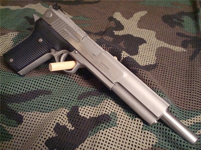 gunrunnerhell:  AMT Automag IV As you can see on the photo of the slide, this Automag