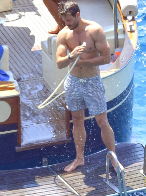 niftyshadesofmelissa:  Jamie Dornan Shows Off His Chiseled Wet Body on boat trip in Capri, Italy 