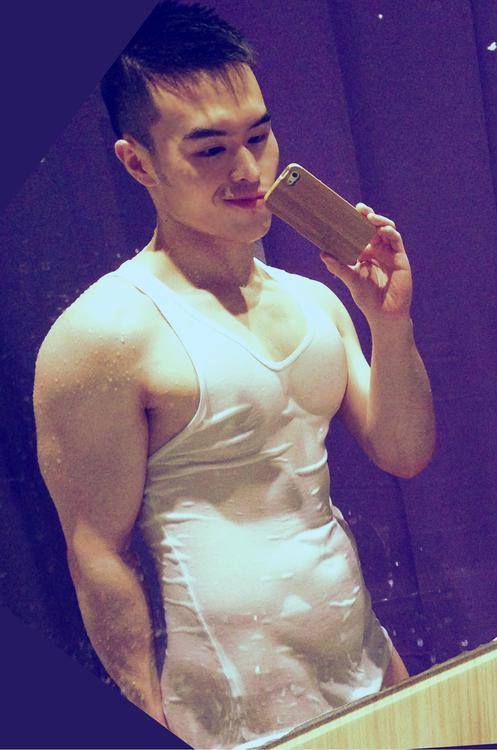 j-aime-asian-men:  Love your cheeky smile.. and the see through top